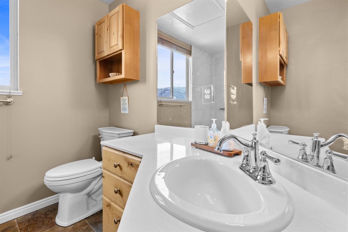 Thoughtfully designed ensuite layout with mountain views.
