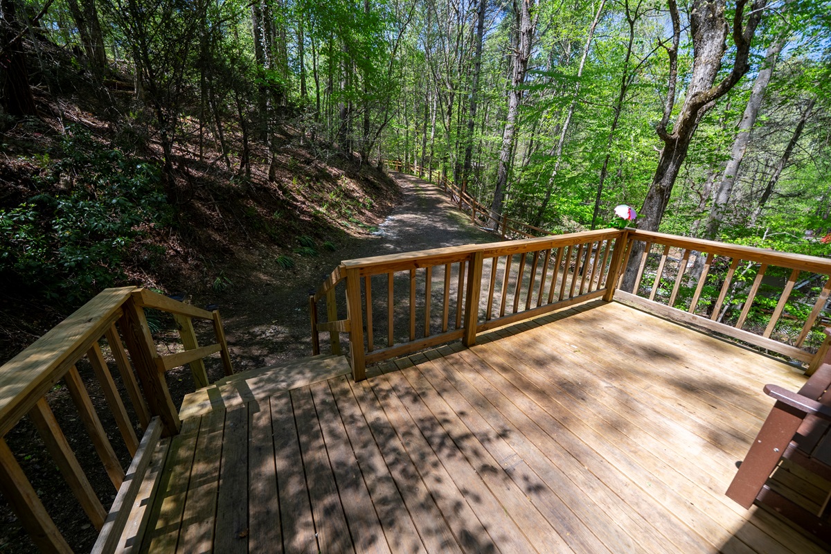 Start your day on the front deck with fresh air, coffee, and the quiet of the surrounding woods.