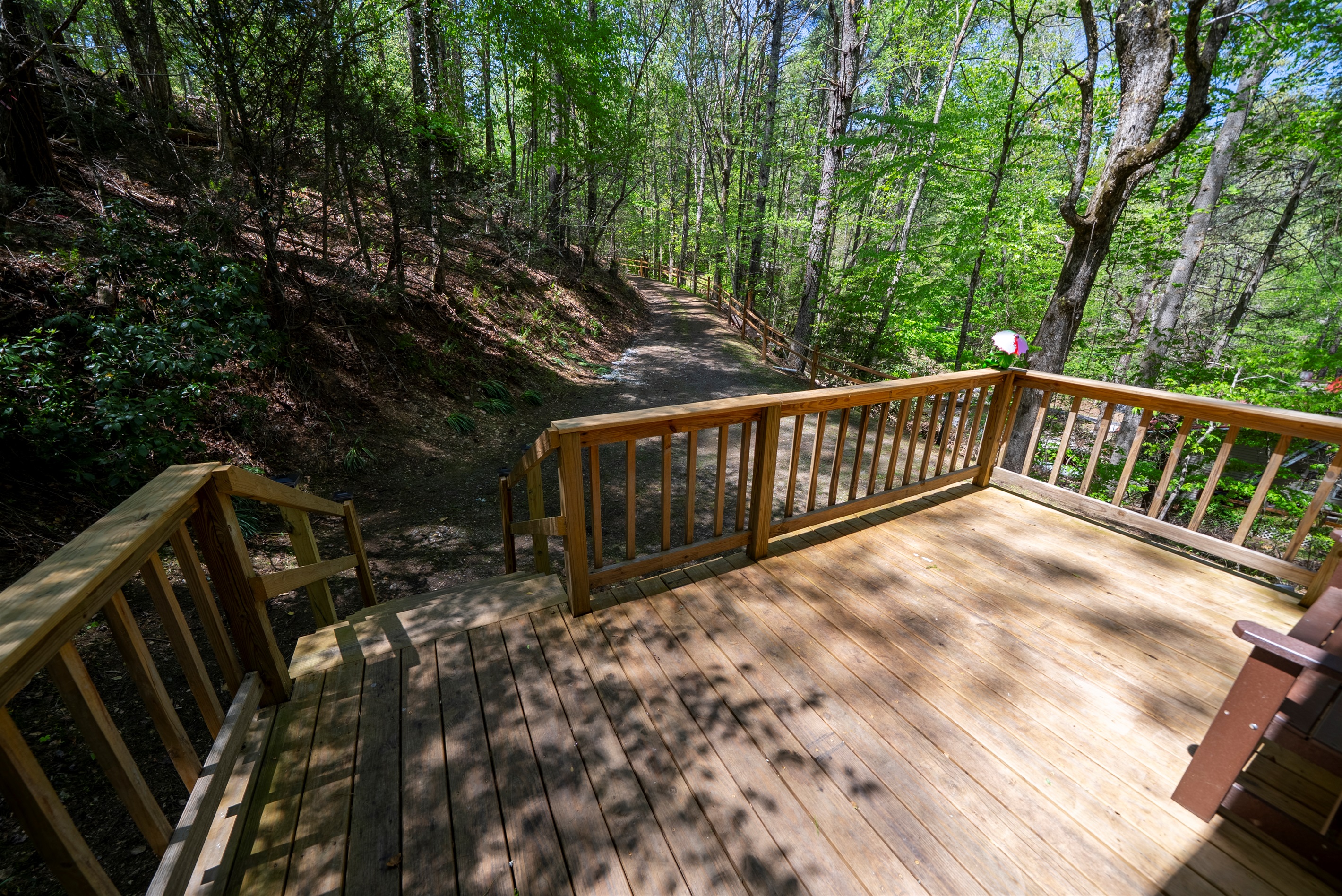 Start your day on the front deck with fresh air, coffee, and the quiet of the surrounding woods.