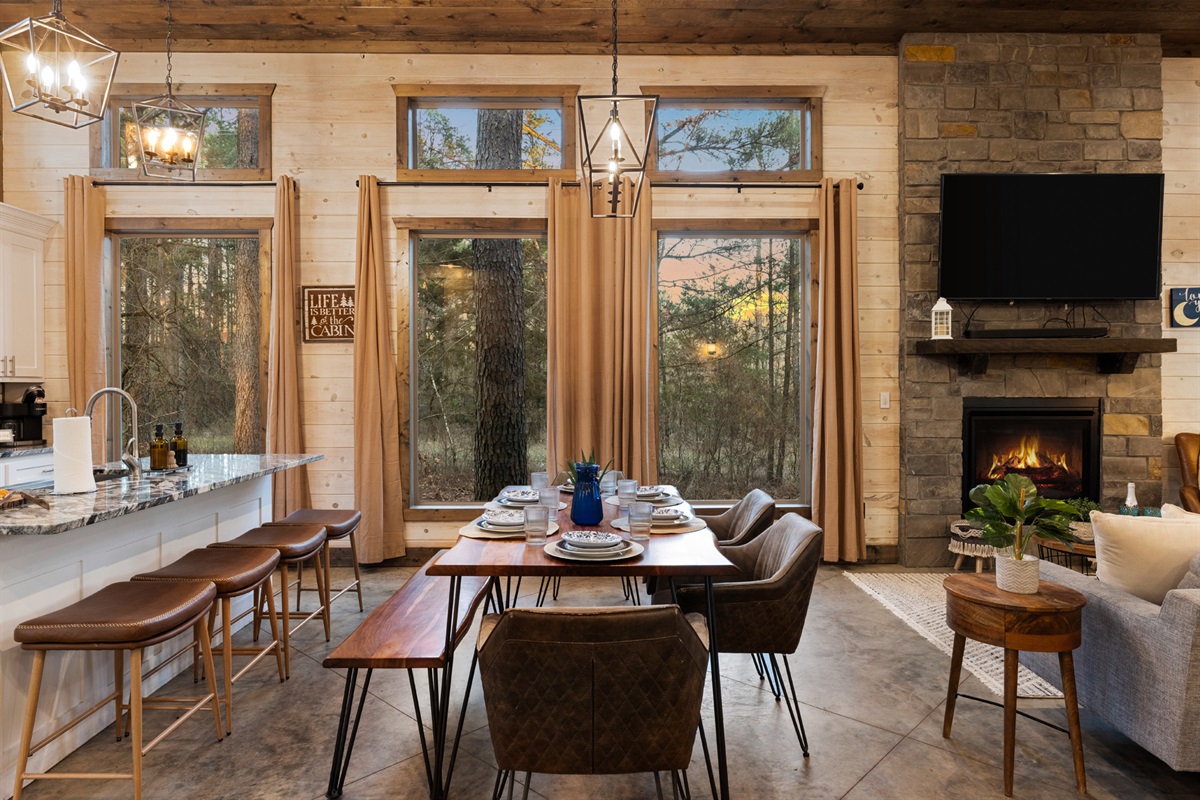An open, effortless flow from kitchen to living room makes hosting a breeze. Prep snacks, plate brunch, and stay part of every laugh and story while the fire flickers nearby.