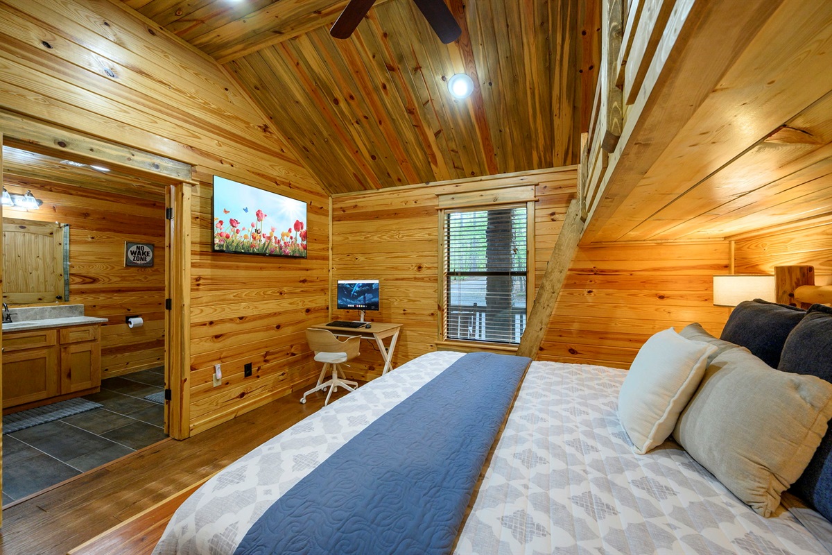 Bunk room has access to full bath that is also accessible from hallway.