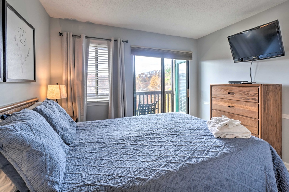 Bedroom #1 with en suite bathroom & balcony access