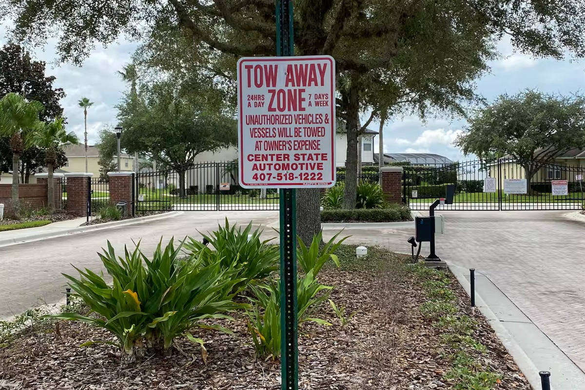 Community signage and parking information — please review before arrival.
