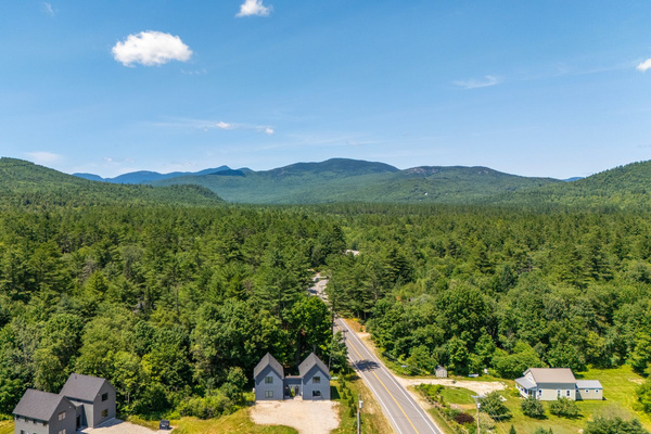 Beautiful panoramic views showcase the peaceful natural surroundings and nearby mountains.