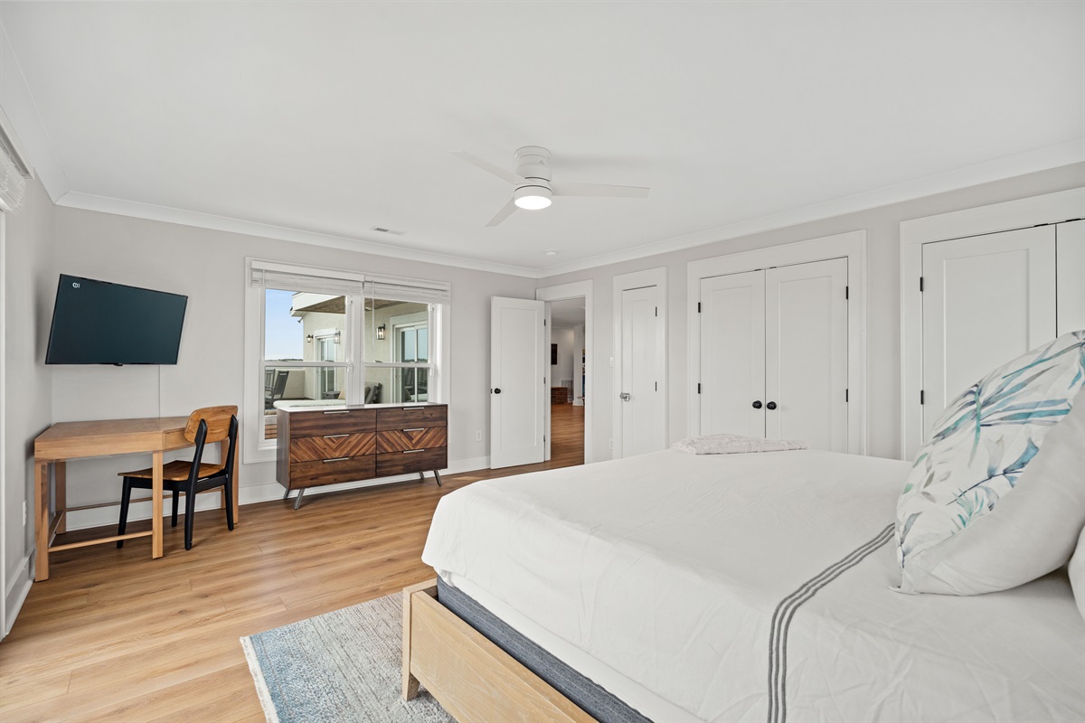 Relax in comfort with a dedicated workspace, mounted TV, and plenty of room to unwind