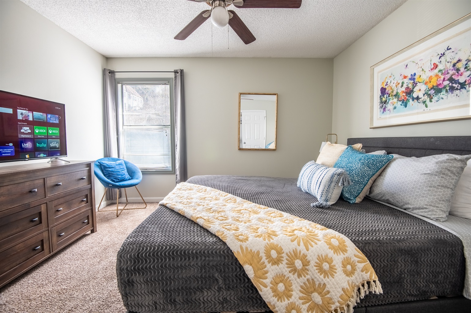 The king bedroom in Unit F is thoughtfully designed with your comfort and rest in mind and includes extra seating and a smart TV with all your favorite streaming channels.