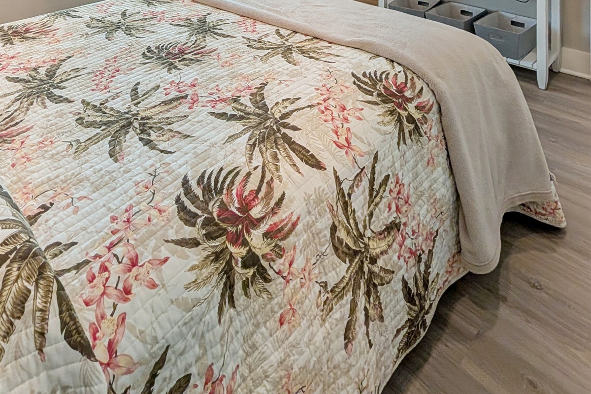 Master suite with queen bed and smart tv