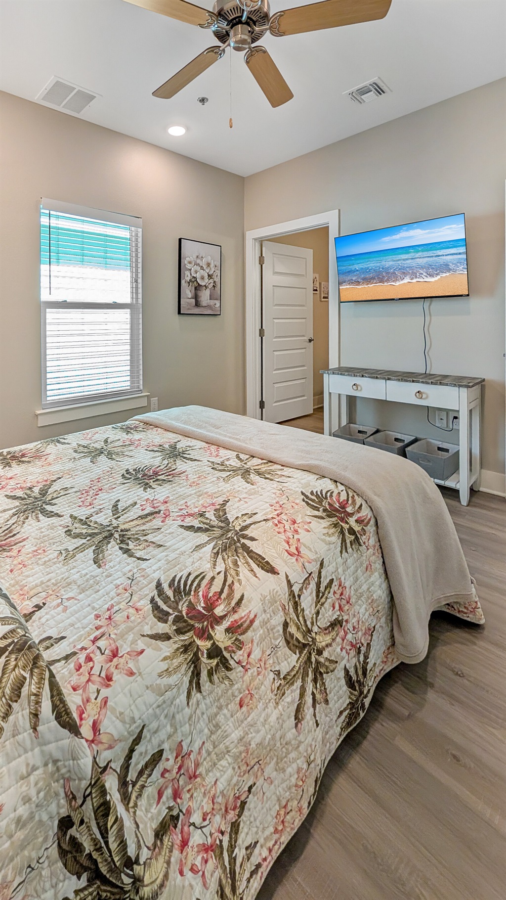 Master suite with queen bed and smart tv