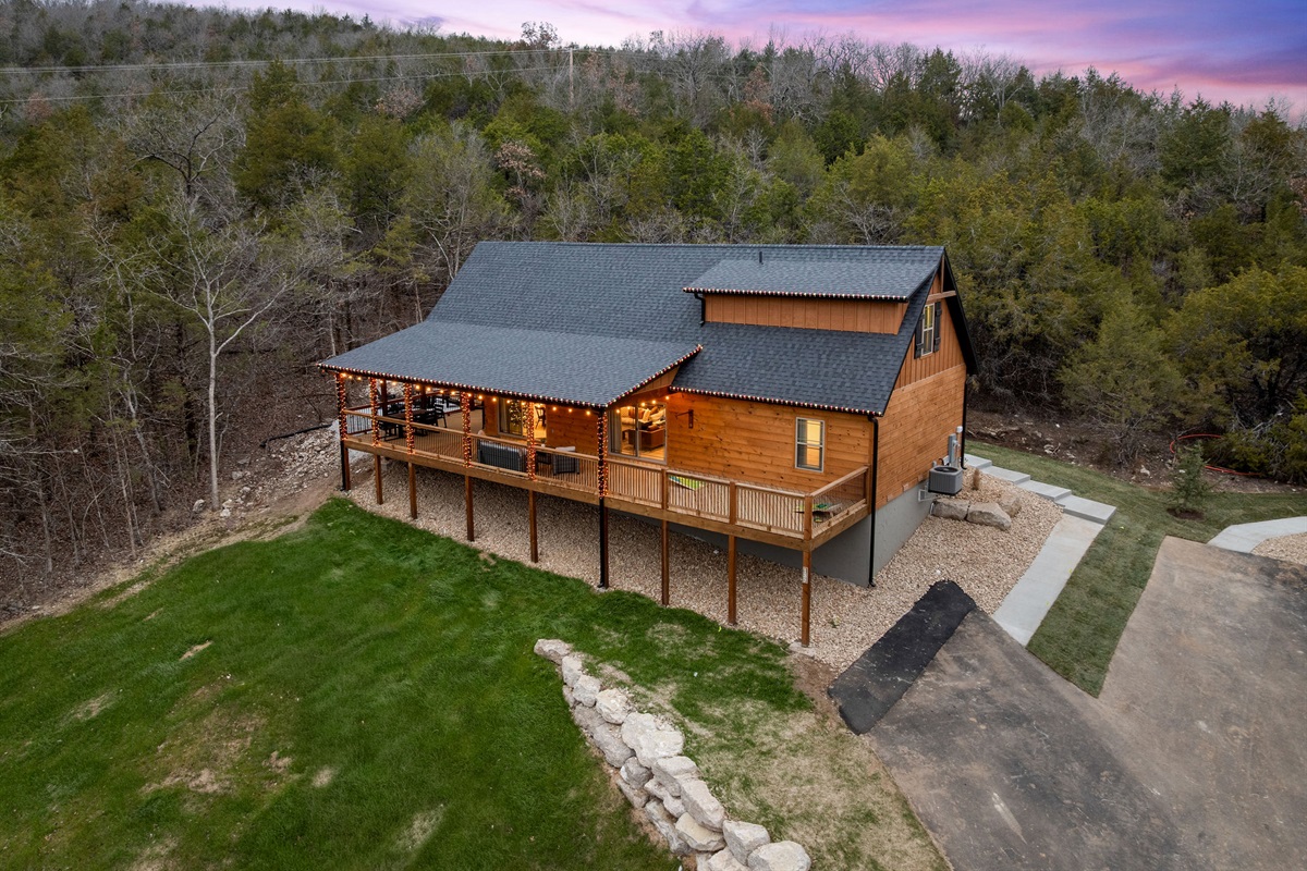 A broader view of the cabin’s setting within the surrounding landscape.