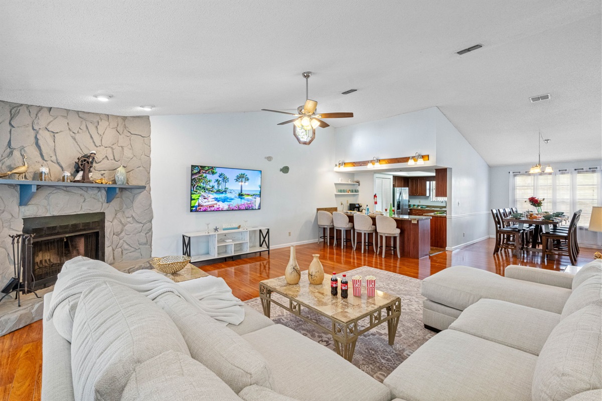 A beautifully designed lounge area with soft neutral tones, rich hardwood floors, and a calming atmosphere—perfect for morning coffee or winding down after a day of adventure.