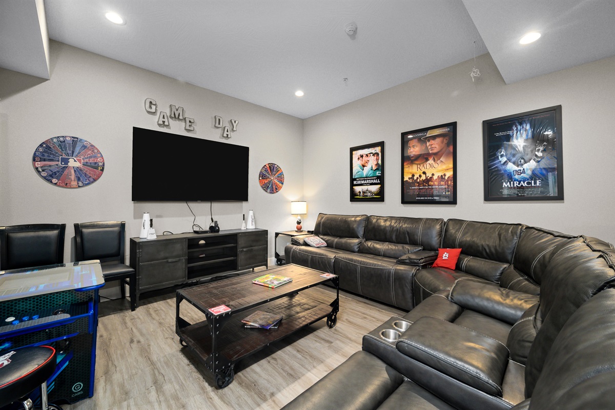 Cheer on your favorite team on this 75" TV and comfortable sectional