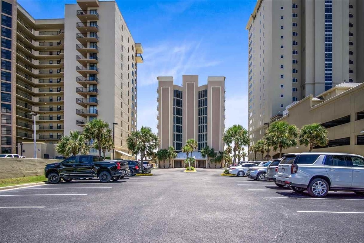 This prominent beachfront building stands as a testament to coastal architecture, providing residents and guests with an unparalleled seaside experience.