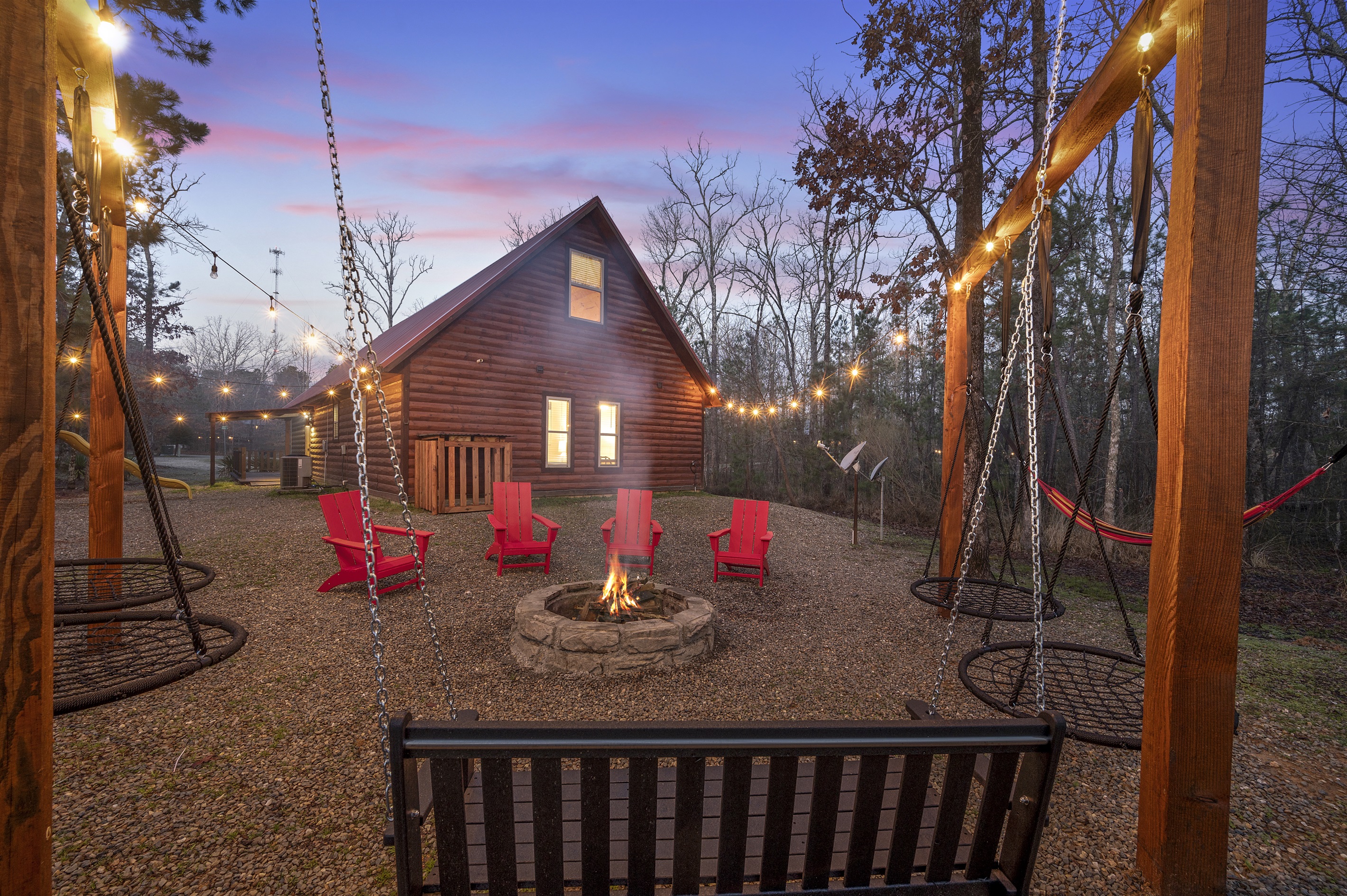Gather 'round the fire pit in our backyard oasis - where stories are shared, memories are made, and warmth fills the night air