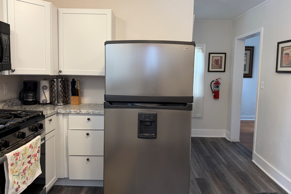 The kitchen flows into the dining room.