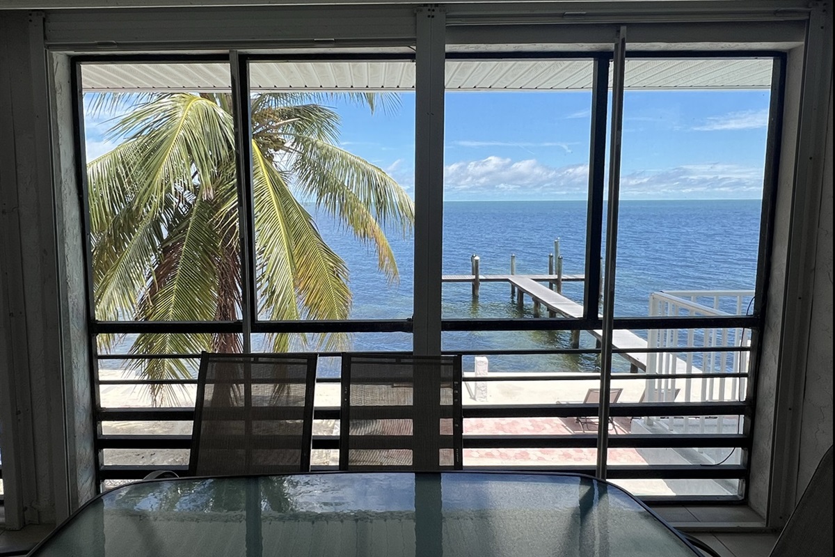 Screened-in porch – Enjoy Gulf views and al fresco dining in comfort