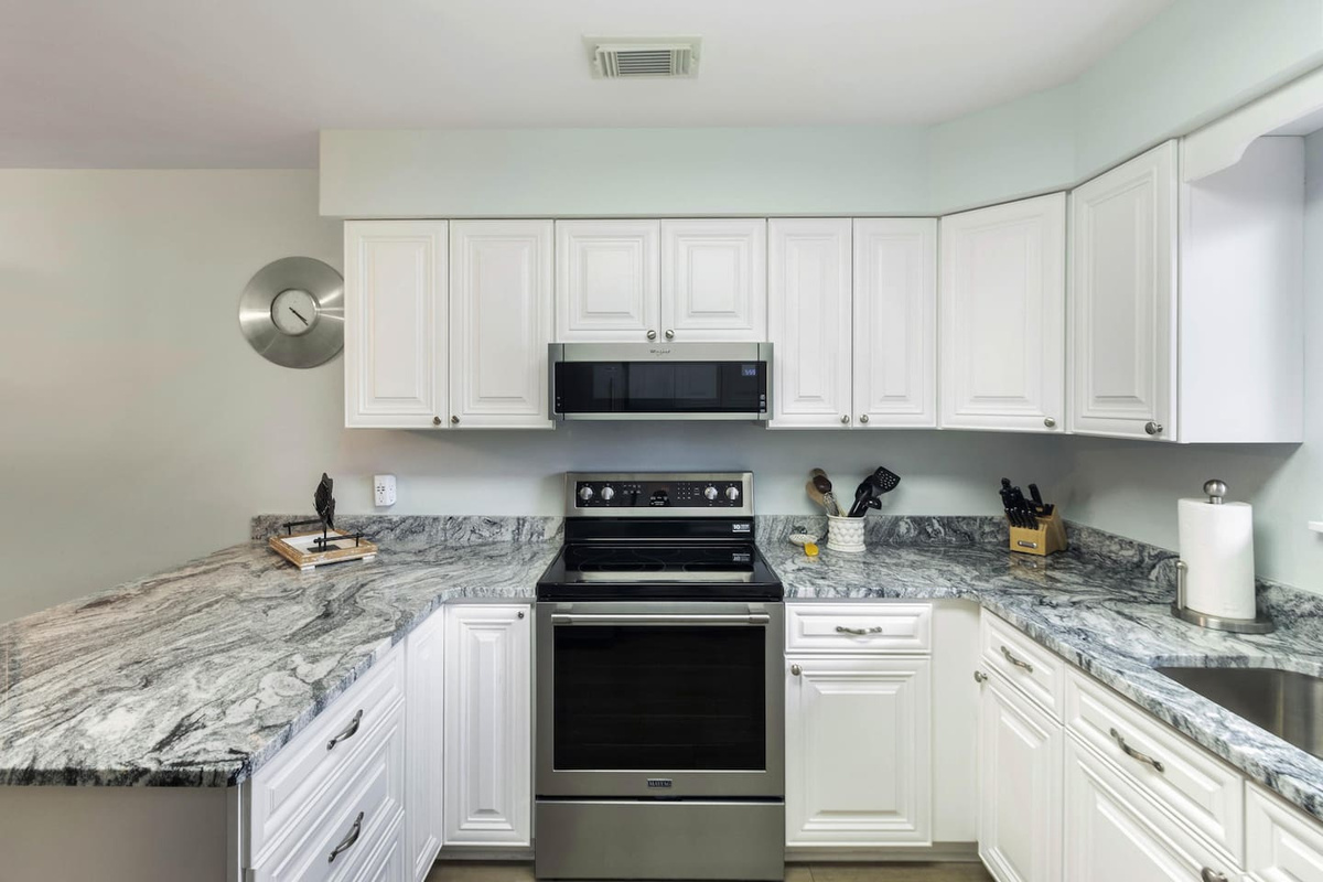 Spread out on the granite counter and cook like you mean it &mdash; this kitchen is ready for a week of home cooking.