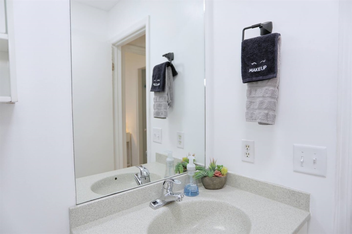 The full bath features a convenient tub/shower combo and comes stocked with shampoo, conditioner, body wash, and a hair dryer for your comfort.