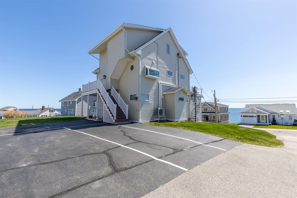 Parking space #2 for One Car- Extra parking further down past shed on grassy area.
