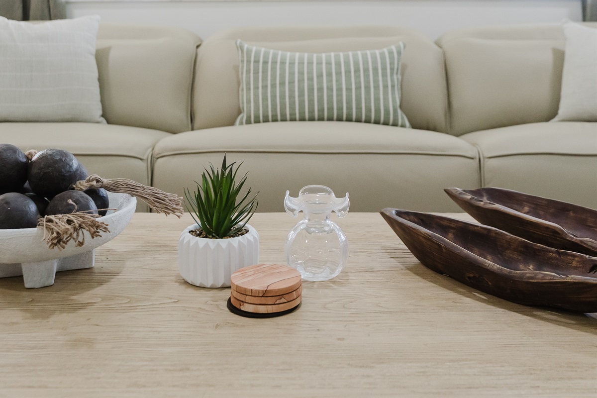 Bright, open living space filled with natural light and golf course views. Comfortable seating is perfect for relaxing after a day at the beach or golf. A spacious living area designed for both comfort and style.