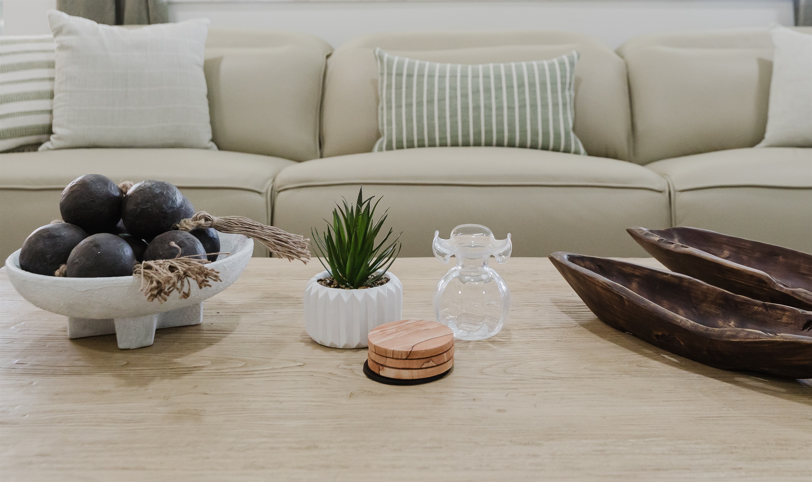Bright, open living space filled with natural light and golf course views. Comfortable seating is perfect for relaxing after a day at the beach or golf. A spacious living area designed for both comfort and style.