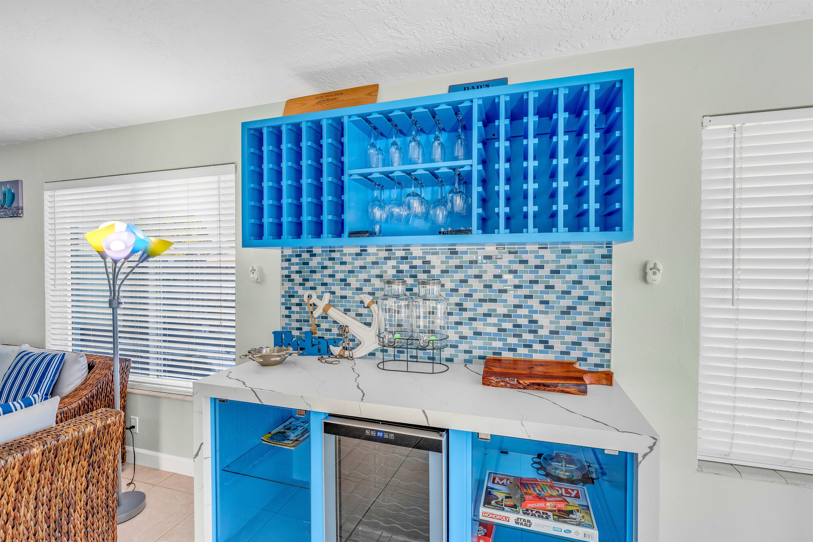 Our beverage station provides more space for your drinks, along with a place we store some family friendly games for your use.