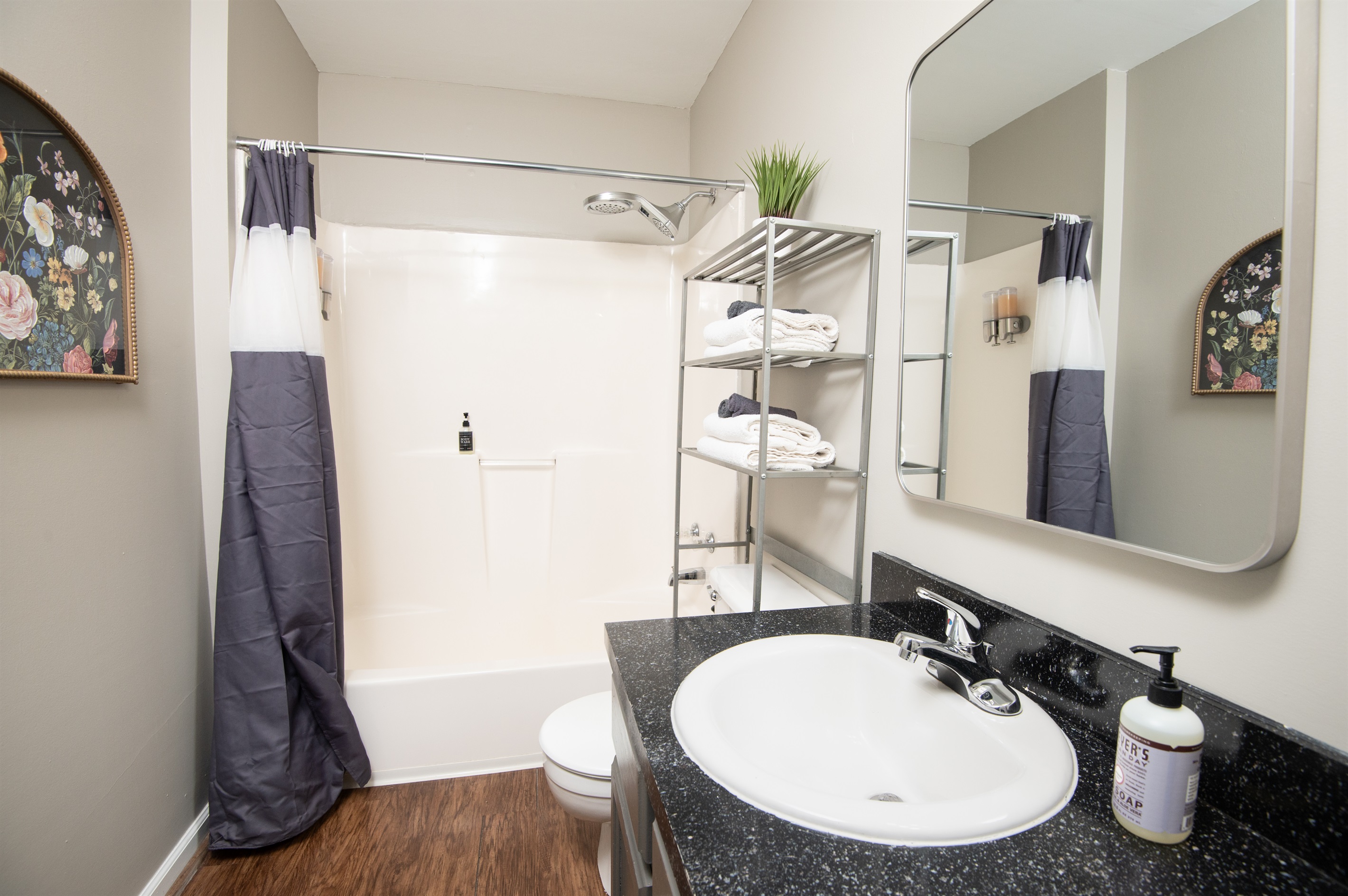 Unit F has a hallway bathroom completely stocked with towels, soaps, and anything else you might need!