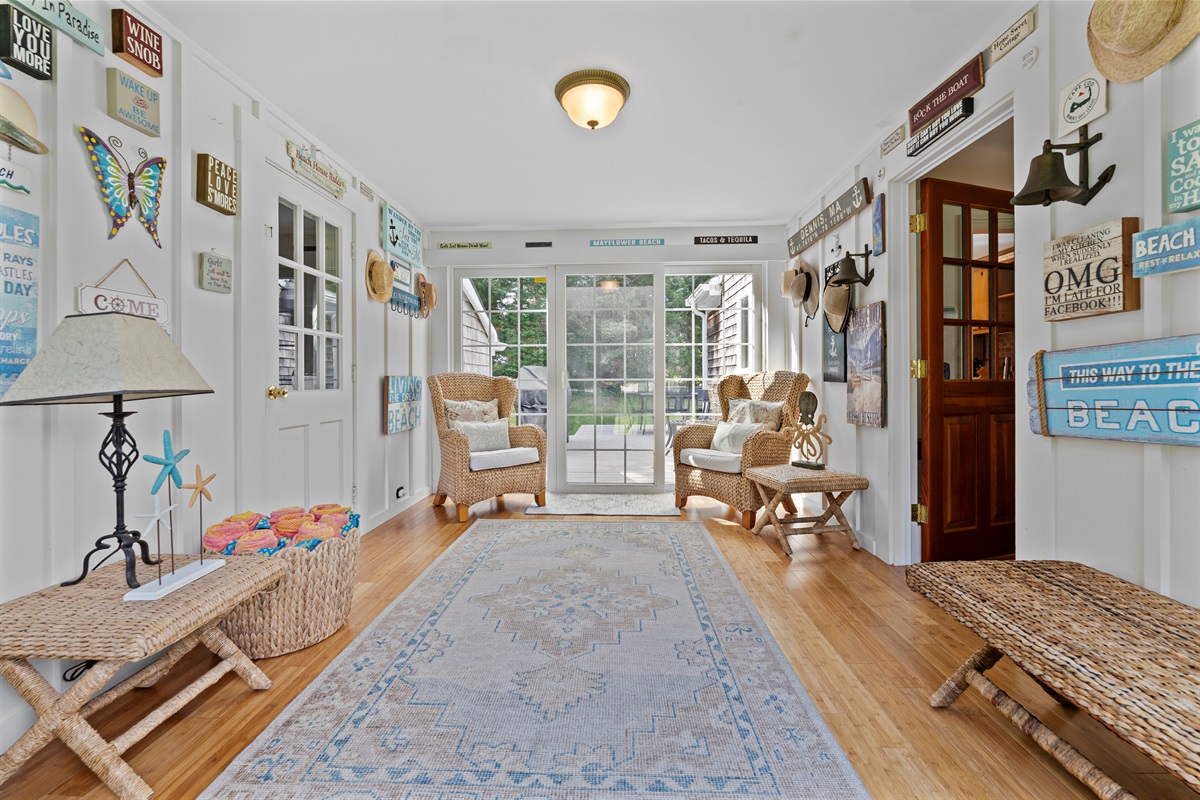 As you enter, you'll find our hallway—on the right is the living area, and on the left is the garage.