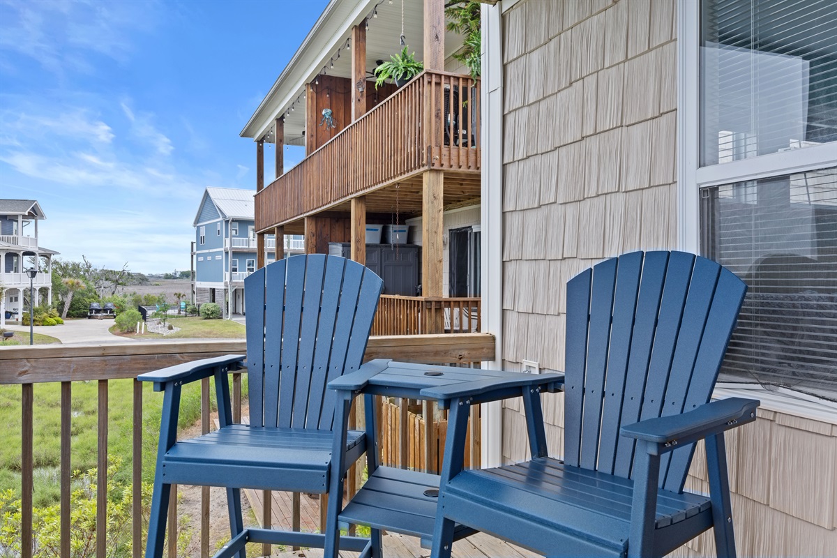 Private balconies with Adirondack seating&mdash;perfect for morning coffee and coastal breezes