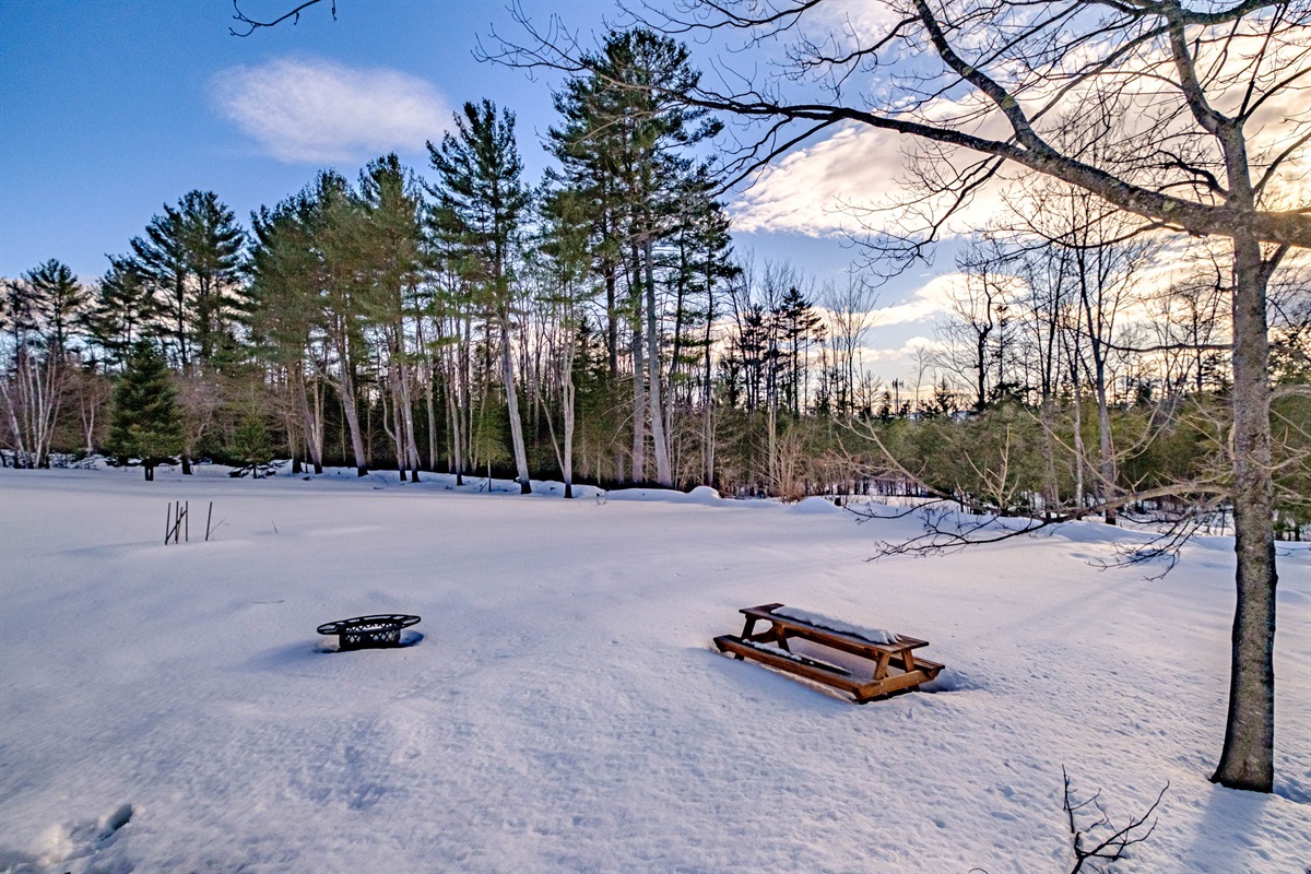 Enjoy outdoor nights around this inviting firepit