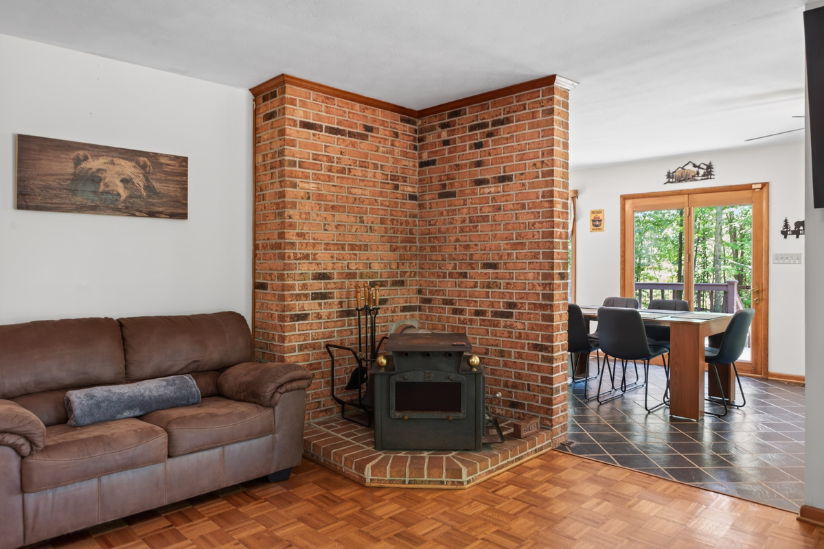 Living Room: Bright and inviting space with a rustic flair, perfect for memorable gatherings!