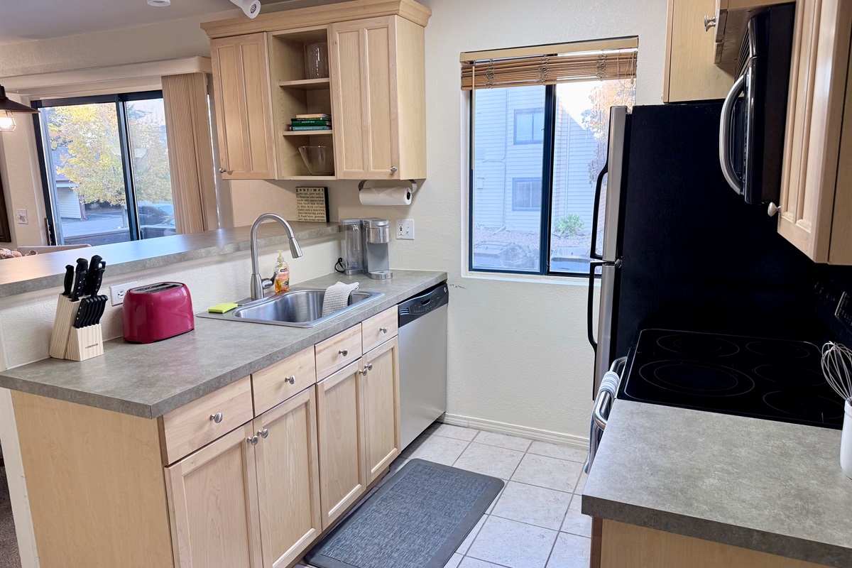 Full kitchen with everything you'll need for a short or extended stay!
