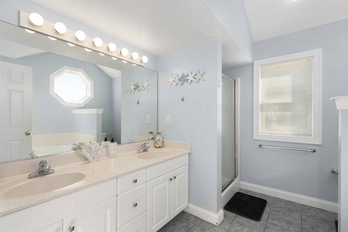 Master bathroom with shower, double vanity and jacuzzi tub