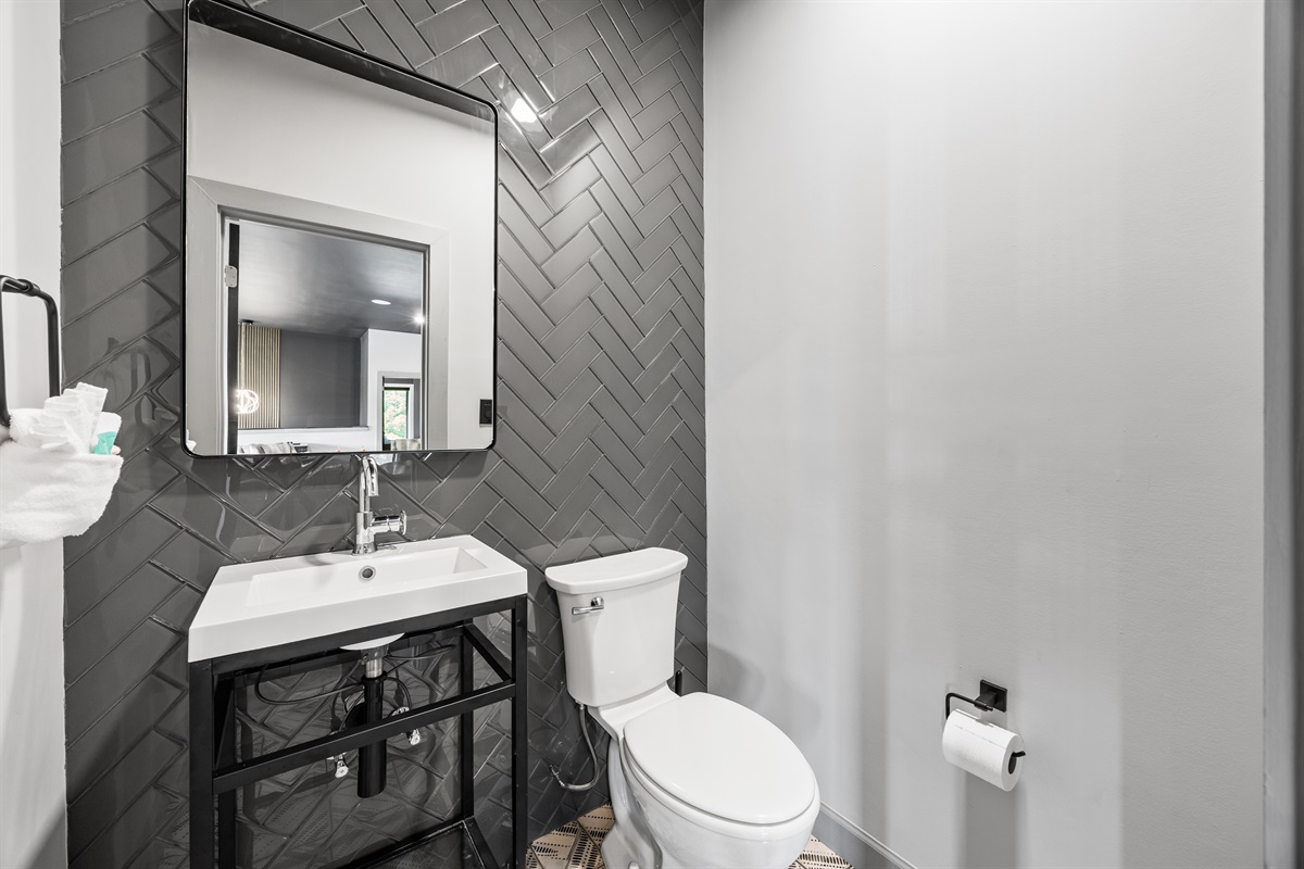 Half bathroom in the common area.