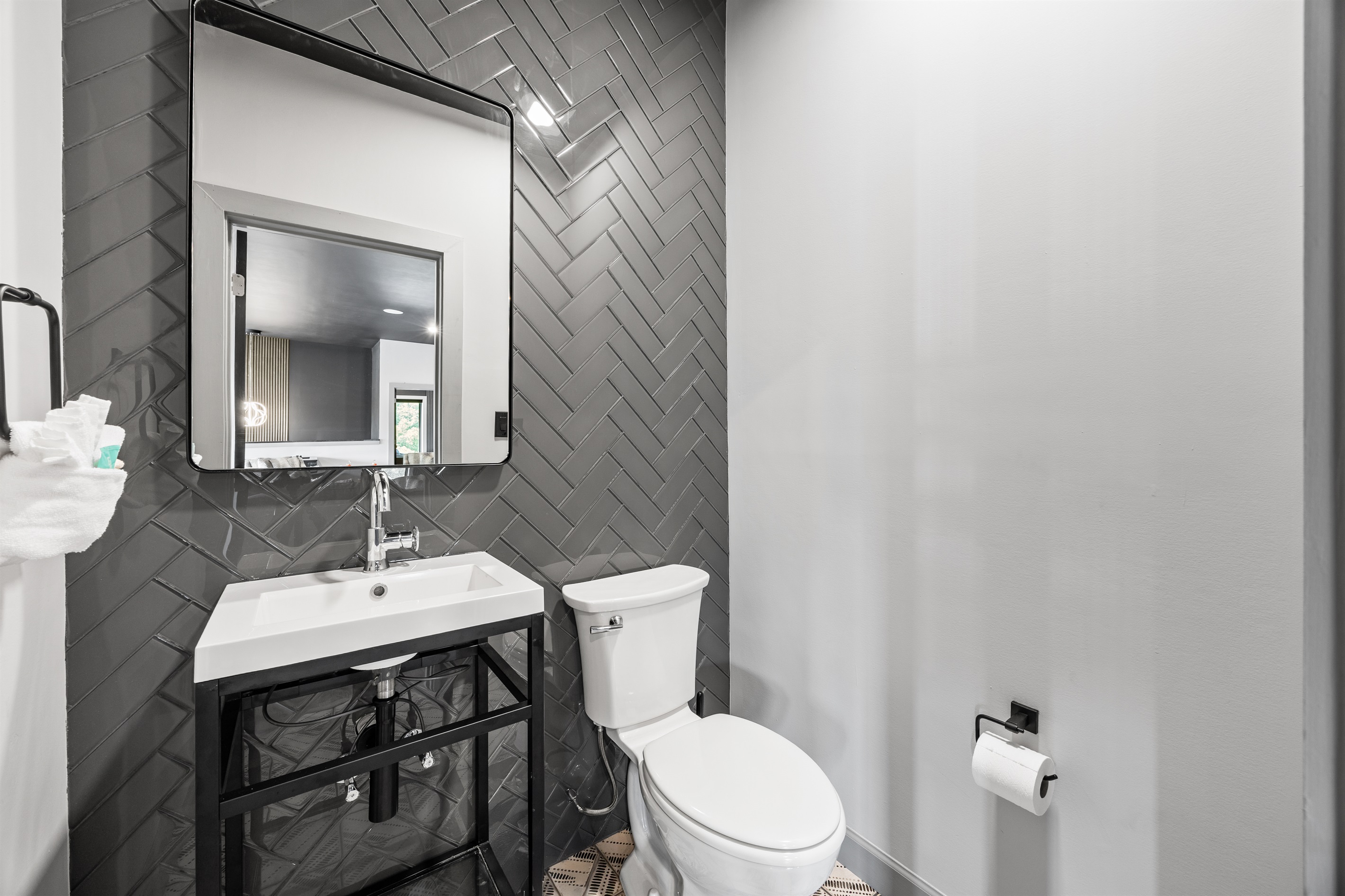 Half bathroom in the common area.