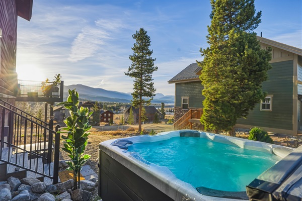 Outside, the experience continues. A private hot tub offers the perfect place to unwind after a day of exploring!