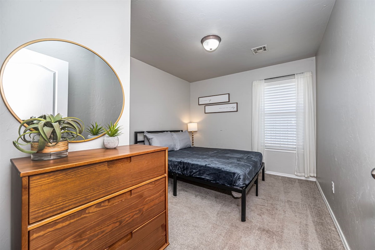 Inviting queen bedroom—perfect for friends, family, or extra guests.