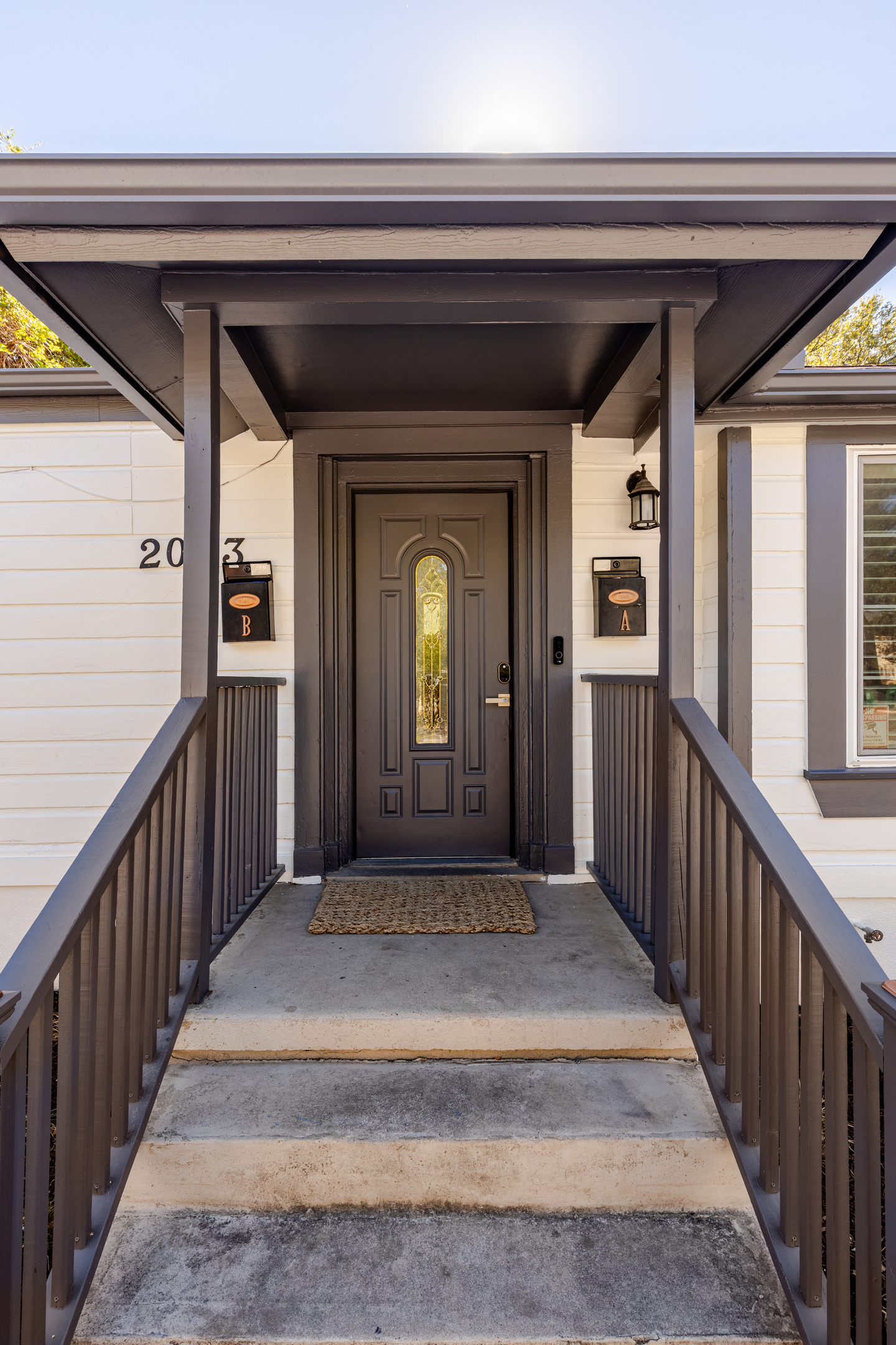 Step into your Austin getaway through this inviting front door and porch!