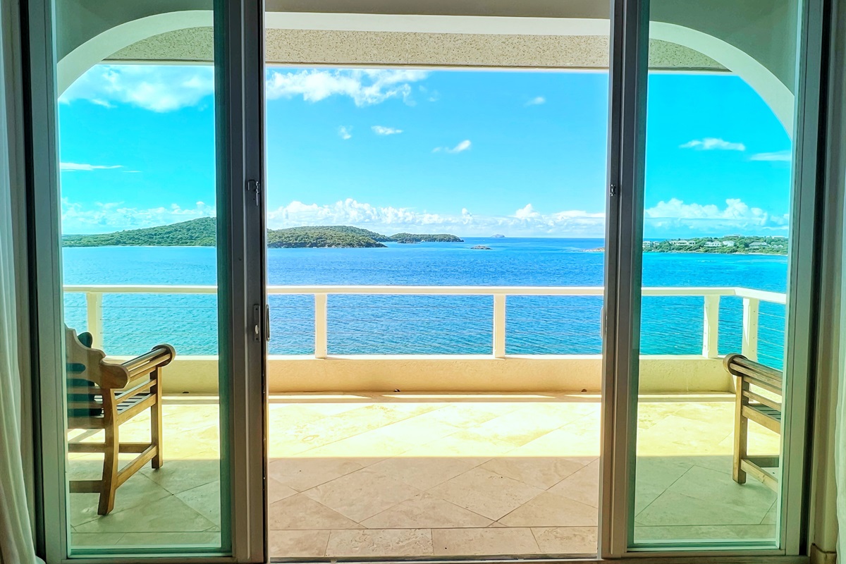 Slide open the glass doors and you'll hear the ocean crashing below.