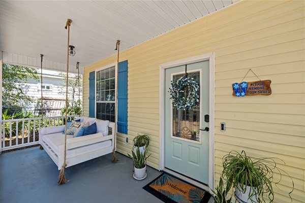 Our favorite spot — sway gently on the porch swing with a book, a breeze, and your morning coffee.