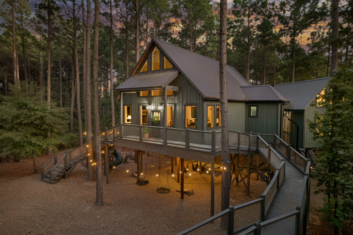 Elevated among the trees and connected by walkways, The High Life Treehouse was designed to bring a childhood dream to life — only better.