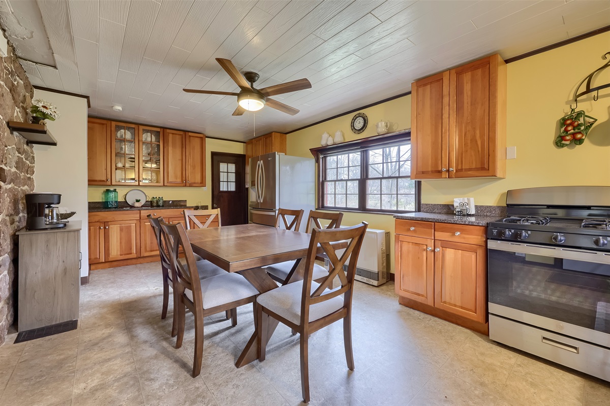 Full Kitchen stocked with utensils needed.