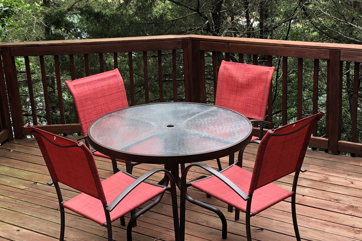 Patio table and chairs to enjoy eating outside and enjoying the views