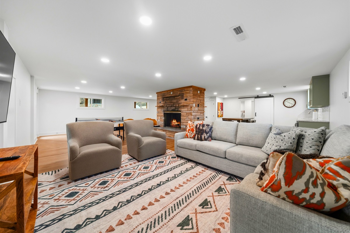 With plenty of seating and room to spread out, the lower-level living area creates another inviting place for everyone to relax together.