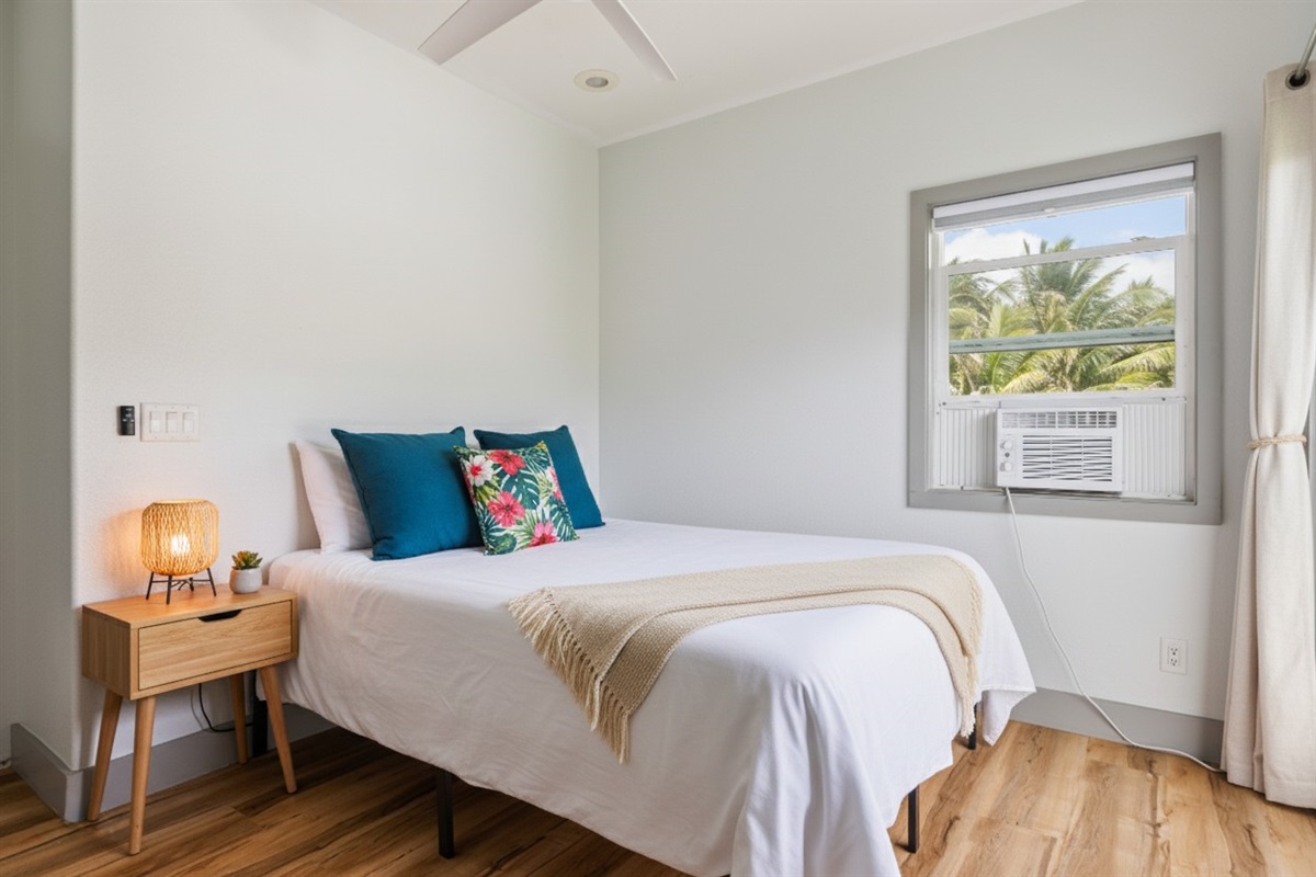 Queen Bed | Representative Interior. Finishes & Decor Vary By Unit