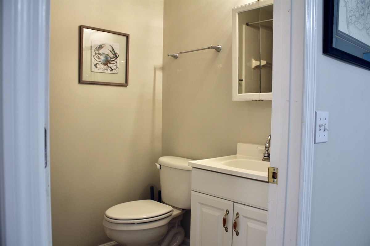 A clean and well-appointed full bathroom with all the essentials for a comfortable stay.