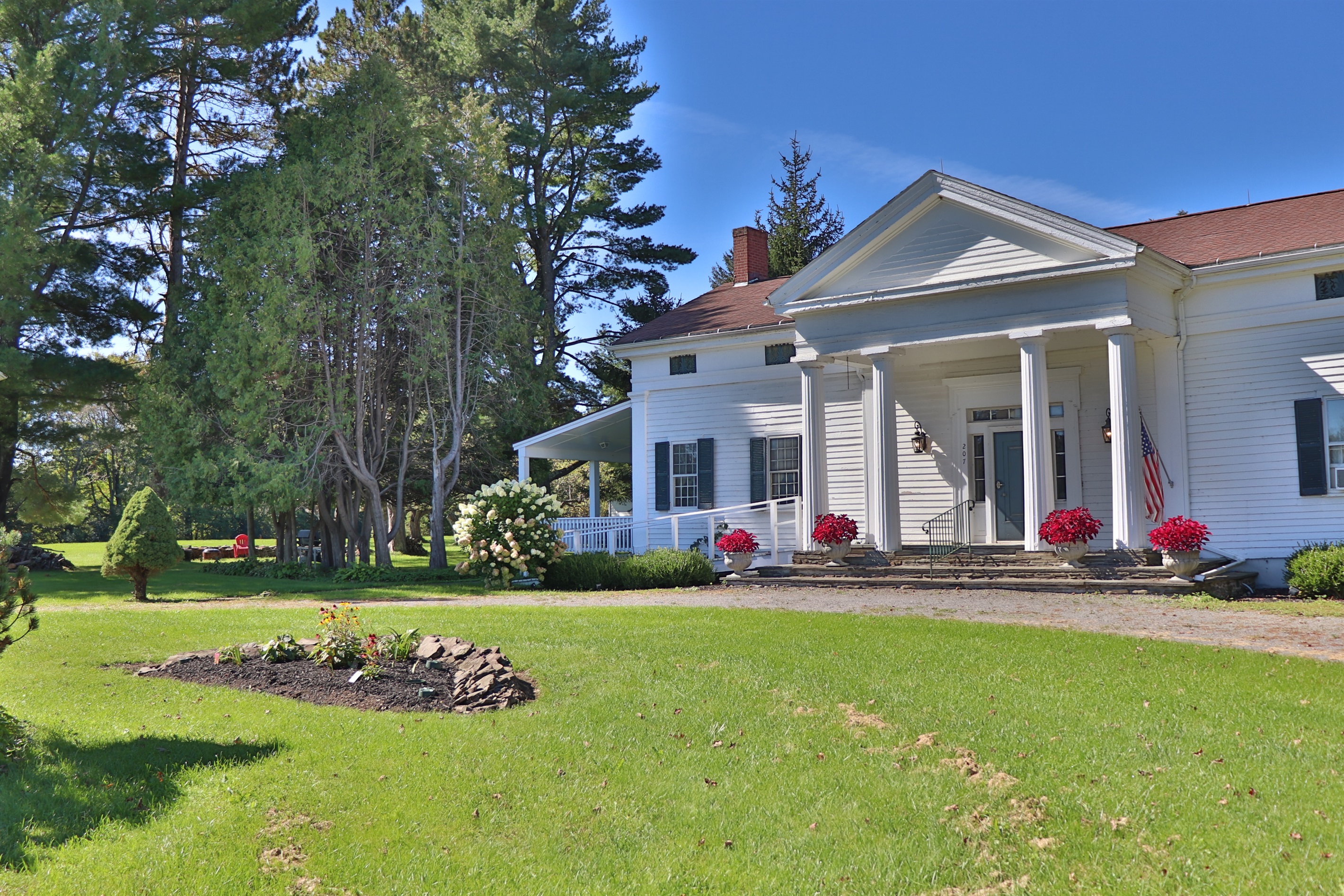 Front exterior of The 1819 House - Classic tall columns line the front stone porch.