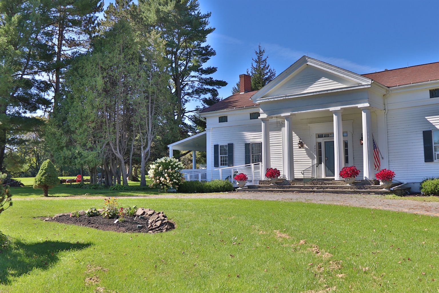 Front exterior of The 1819 House - Classic tall columns line the front stone porch.