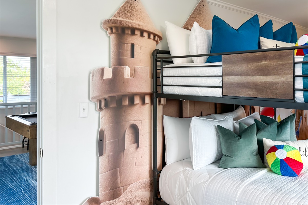 Kids will love the super size sandcastles and beach vibes!