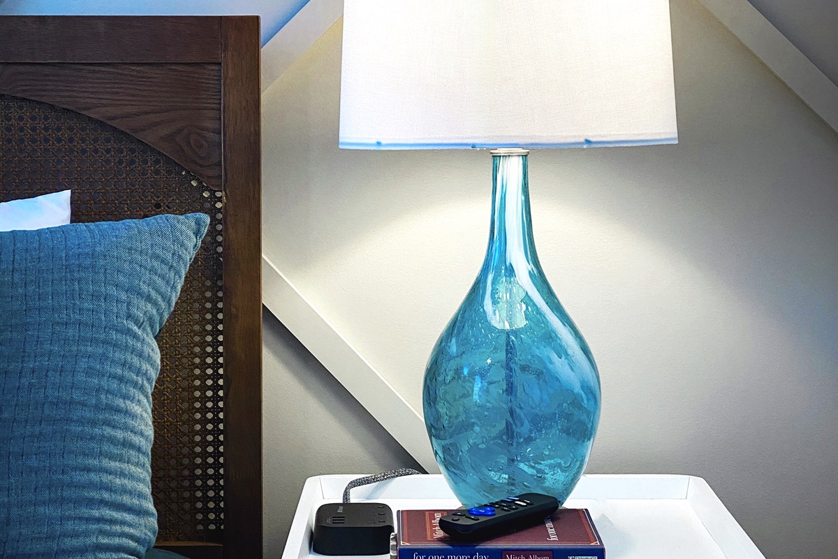 [Bedroom 1] Relax in vacation bliss! Sink into our luxurious king bed and cozy up with a good book. Embrace the ultimate comfort and tranquility, making every moment of your stay truly special. #beachbliss