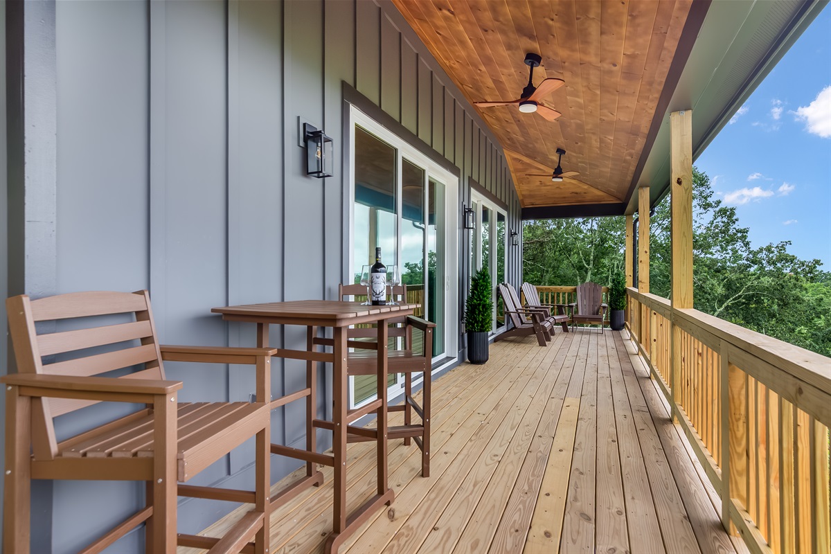 Wrap around porch with ample seating 